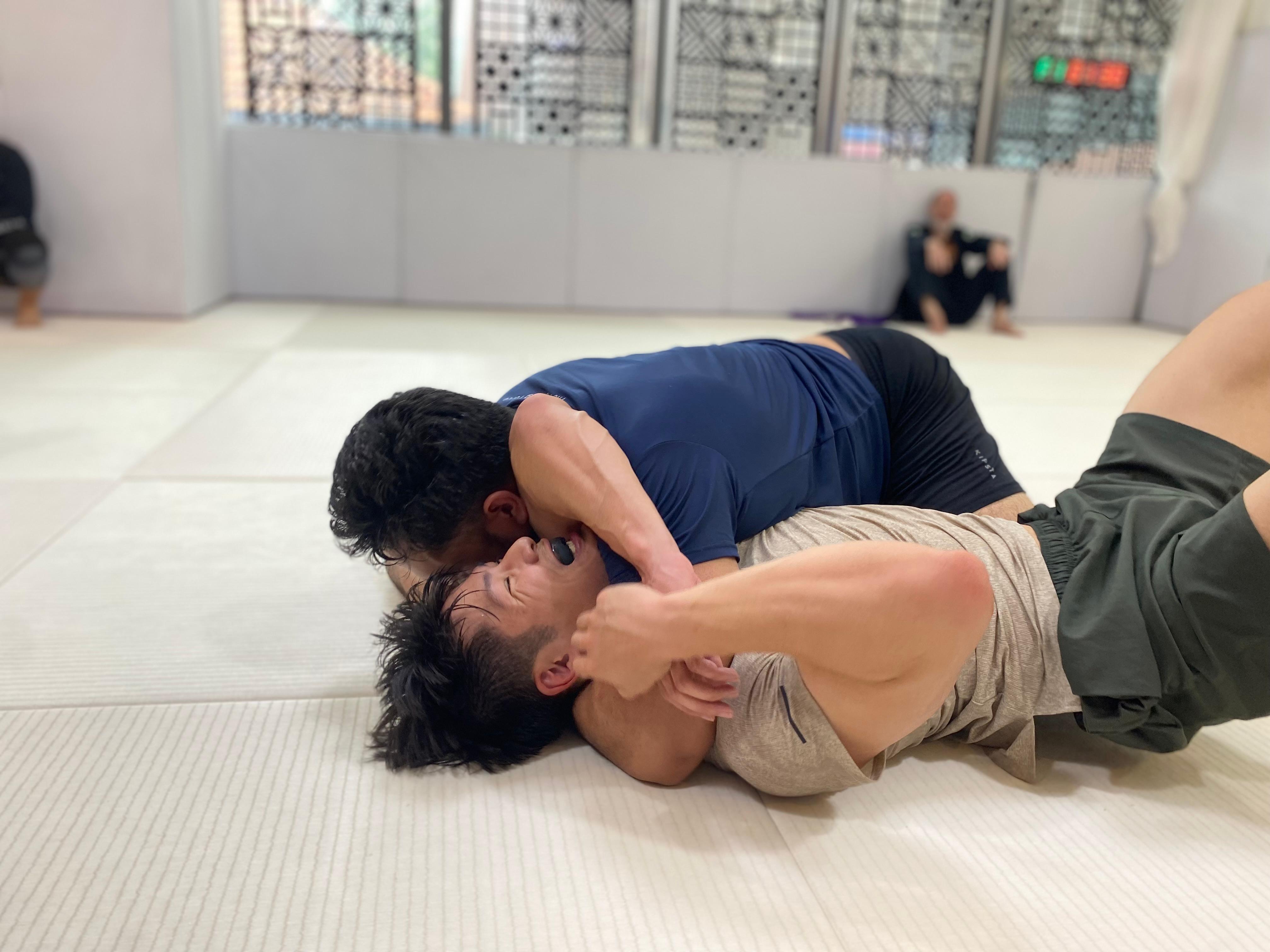 Wrestling pin control during Jiu-Jitsu training in Singapore
